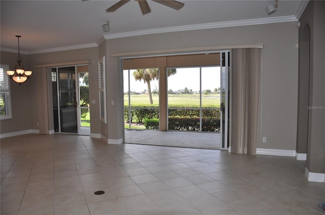 3959 San Rocco Ct Unit 911, Punta Gorda, FL 33950 - tiled empty room with a ceiling fan, a chandelier, baseboards, and ornamental molding