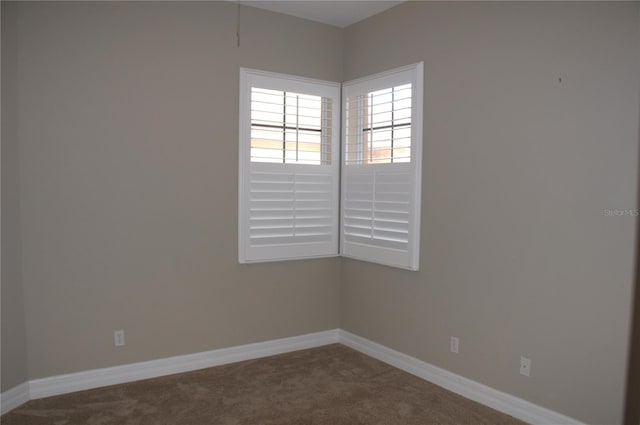 view of carpeted spare room