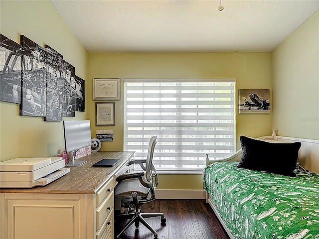 bedroom featuring dark hardwood / wood-style floors