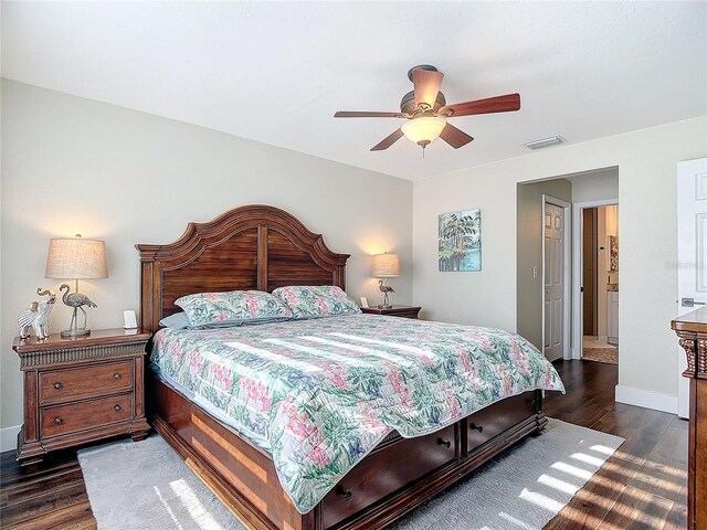 bedroom featuring ceiling fan and dark hardwood / wood-style floors