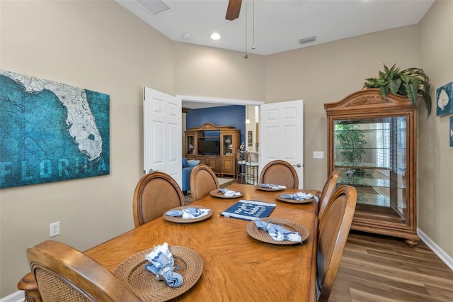 dining area featuring ceiling fan and hardwood / wood-style floors