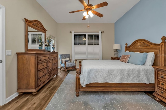 bedroom featuring wood-type flooring and ceiling fan