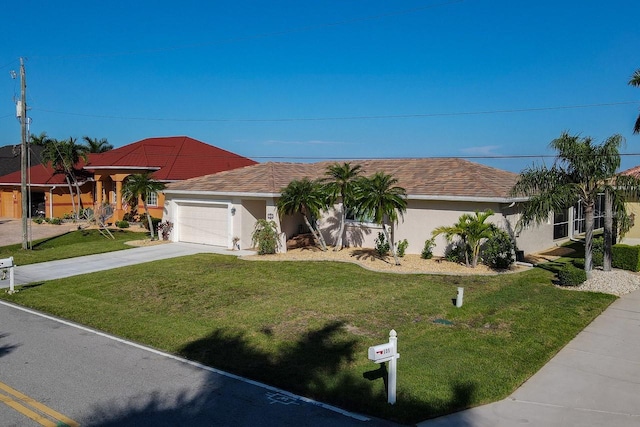 ranch-style house featuring a garage and a front yard