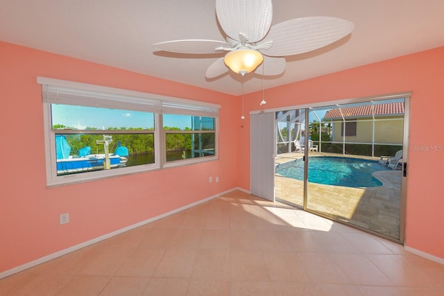 interior space featuring ceiling fan