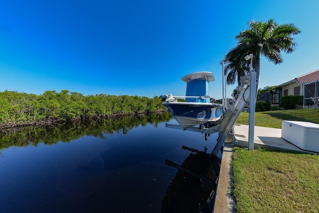 property view of water with a dock