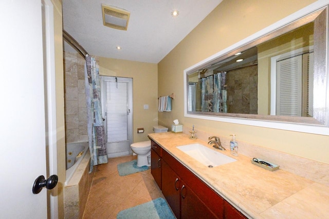 full bathroom featuring shower / tub combo, vanity, toilet, and tile patterned floors