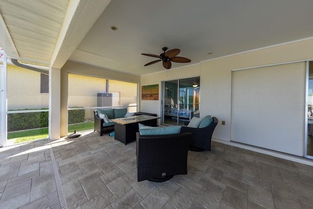 view of patio with ceiling fan and an outdoor living space