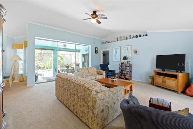 living room featuring ceiling fan, ornamental molding, light carpet, and vaulted ceiling