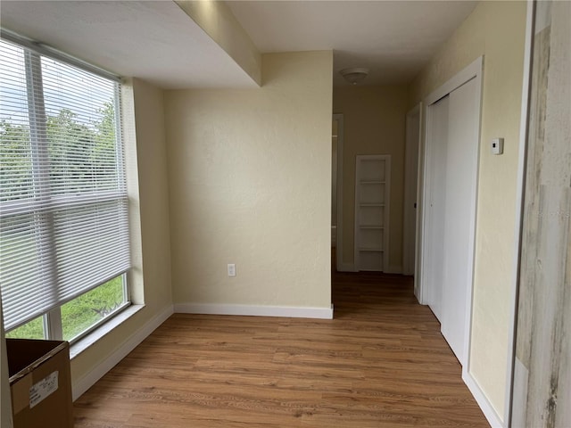 interior space with hardwood / wood-style floors