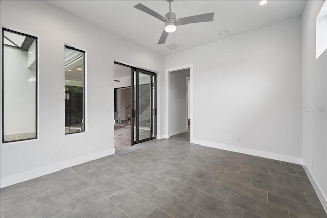 unfurnished room featuring ceiling fan