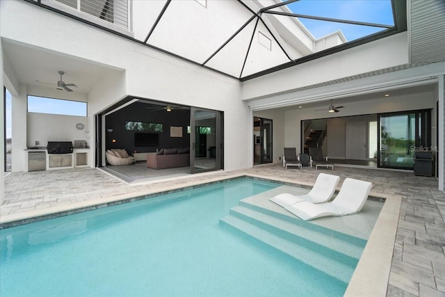 view of pool featuring ceiling fan, area for grilling, a lanai, and a patio