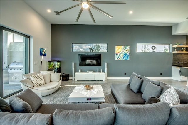 living area with visible vents, baseboards, a ceiling fan, and recessed lighting