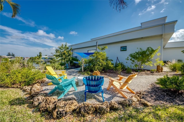 view of patio / terrace with an outdoor fire pit