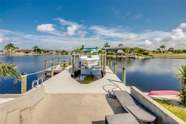 view of dock featuring a water view and boat lift