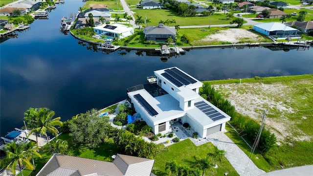 3715 NW 9th Ter, Cape Coral, FL 33993 - aerial perspective of suburban area with a nearby body of water