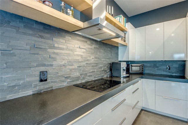 3715 NW 9th Ter, Cape Coral, FL 33993 - kitchen featuring modern cabinets, open shelves, stainless steel microwave, dark countertops, and black electric cooktop