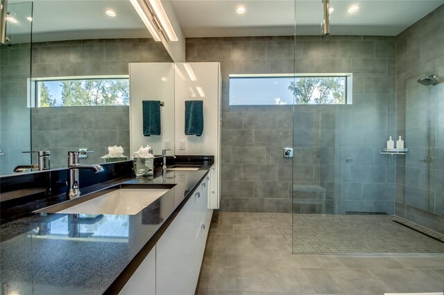 3715 NW 9th Ter, Cape Coral, FL 33993 - full bathroom featuring a walk in shower, double vanity, and tile patterned floors