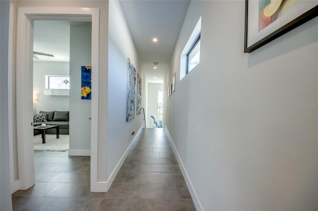 3715 NW 9th Ter, Cape Coral, FL 33993 - hall with dark tile patterned floors, recessed lighting, and baseboards