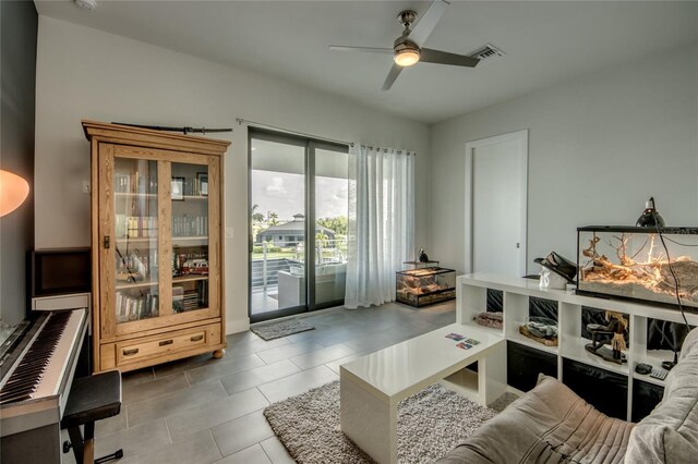 3715 NW 9th Ter, Cape Coral, FL 33993 - living area featuring ceiling fan and tile patterned floors