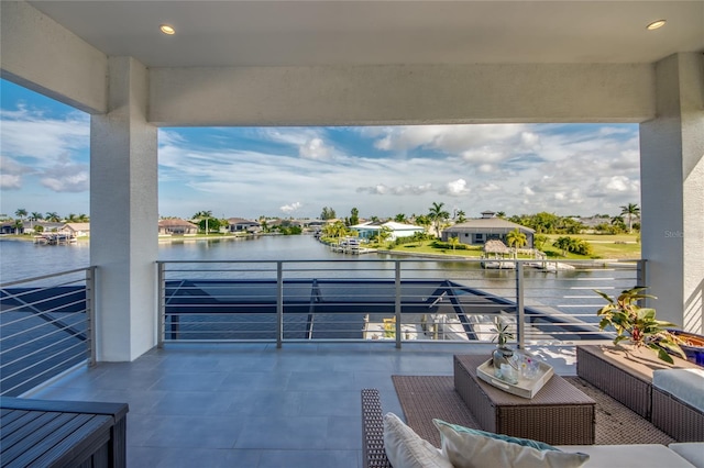 3715 NW 9th Ter, Cape Coral, FL 33993 - balcony featuring a water view, an outdoor living space, and a residential view