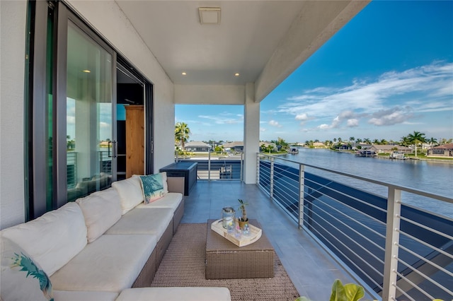 3715 NW 9th Ter, Cape Coral, FL 33993 - balcony with a water view and an outdoor hangout area