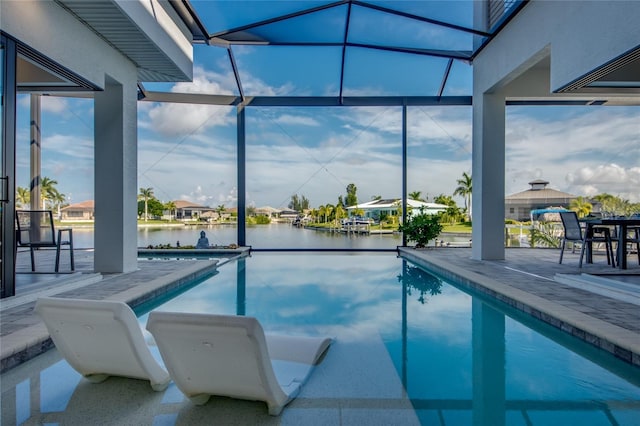 3715 NW 9th Ter, Cape Coral, FL 33993 - swimming pool with a patio, a lanai, and a water view