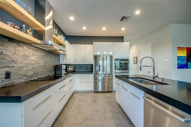 3715 NW 9th Ter, Cape Coral, FL 33993 - kitchen with stainless steel appliances, a sink, modern cabinets, dark countertops, and recessed lighting