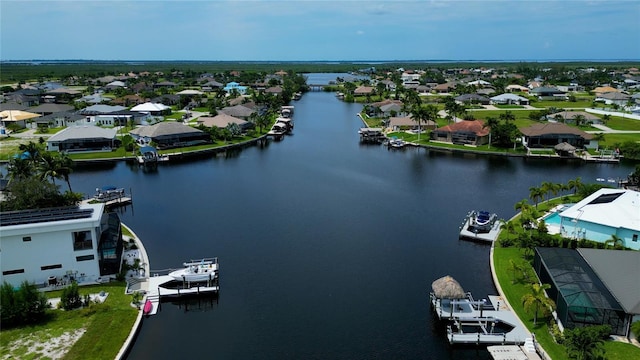 3715 NW 9th Ter, Cape Coral, FL 33993 - aerial perspective of suburban area featuring a nearby body of water