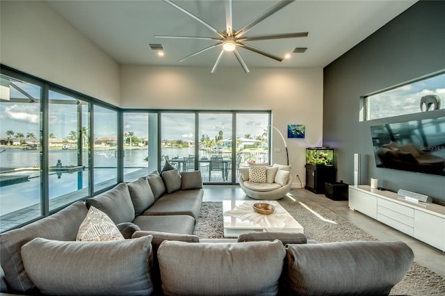 3715 NW 9th Ter, Cape Coral, FL 33993 - living room featuring a ceiling fan