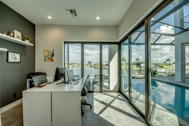 3715 NW 9th Ter, Cape Coral, FL 33993 - home office featuring plenty of natural light, light tile patterned floors, recessed lighting, and baseboards