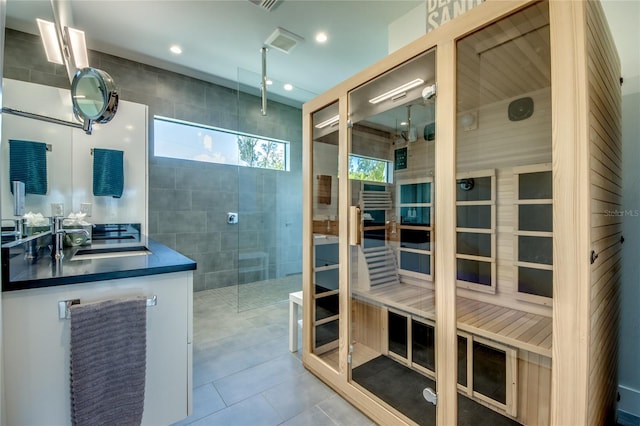3715 NW 9th Ter, Cape Coral, FL 33993 - full bathroom featuring a sauna / steam room, tile patterned floors, a walk in shower, and vanity