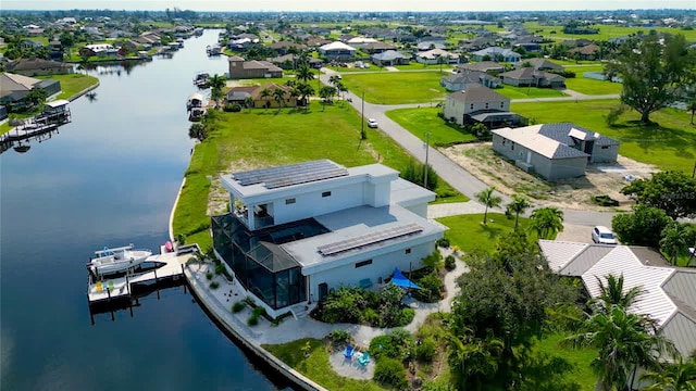 3715 NW 9th Ter, Cape Coral, FL 33993 - aerial perspective of suburban area featuring a nearby body of water