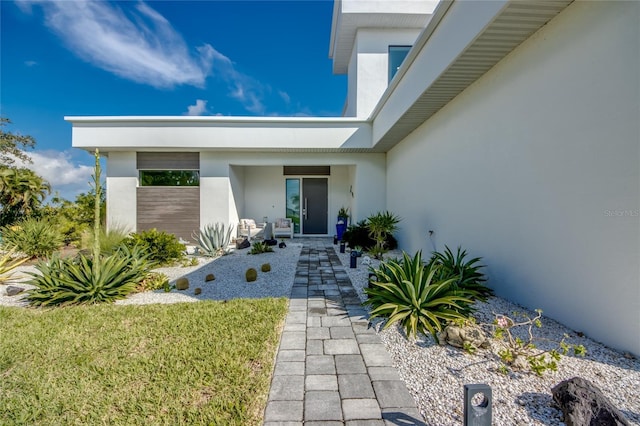 3715 NW 9th Ter, Cape Coral, FL 33993 - property entrance with stucco siding