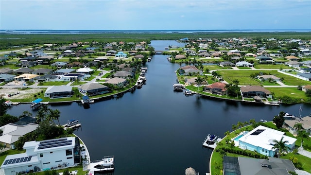 3715 NW 9th Ter, Cape Coral, FL 33993 - aerial perspective of suburban area featuring a nearby body of water