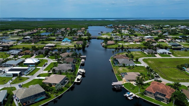 3715 NW 9th Ter, Cape Coral, FL 33993 - aerial view of property's location featuring a nearby body of water and nearby suburban area