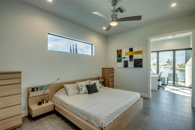 3715 NW 9th Ter, Cape Coral, FL 33993 - tiled bedroom with recessed lighting, baseboards, ceiling fan, and a water view