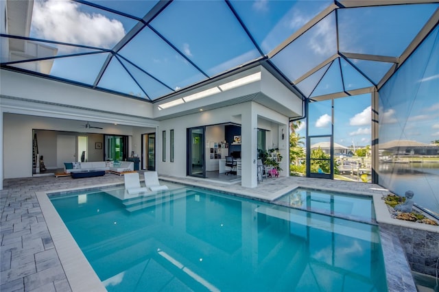 3715 NW 9th Ter, Cape Coral, FL 33993 - view of swimming pool with outdoor lounge area, a patio area, ceiling fan, and a lanai