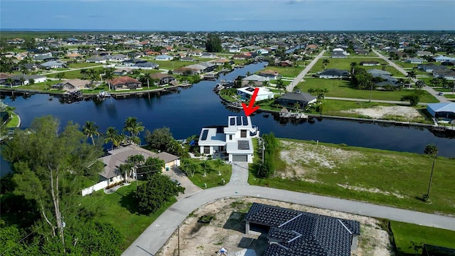 3715 NW 9th Ter, Cape Coral, FL 33993 - aerial perspective of suburban area featuring a large body of water
