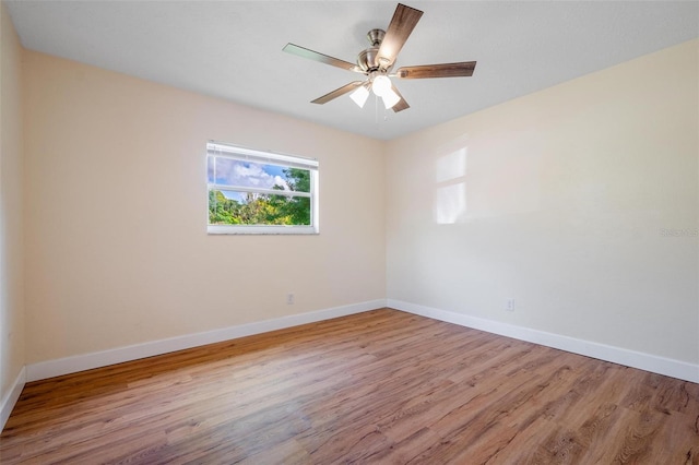 unfurnished room featuring ceiling fan and light hardwood / wood-style floors