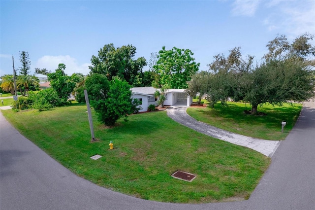 view of front of home featuring a front yard