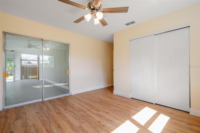 unfurnished bedroom featuring ceiling fan and light hardwood / wood-style floors