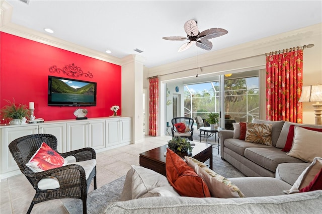 living room featuring ceiling fan, light tile patterned floors, and ornamental molding