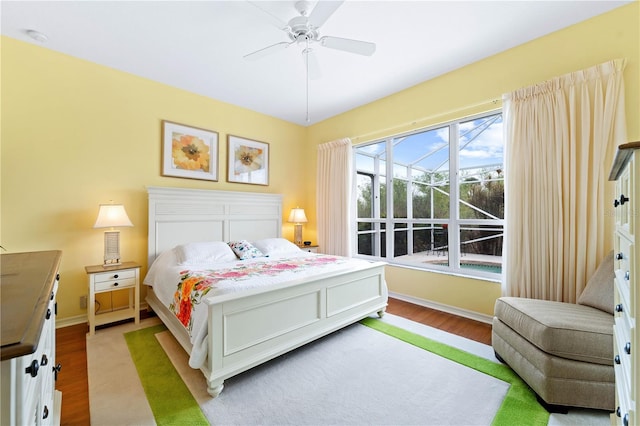 bedroom with ceiling fan and light wood-type flooring