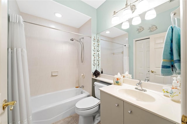 full bathroom with tile patterned flooring, shower / tub combo, vanity, and toilet