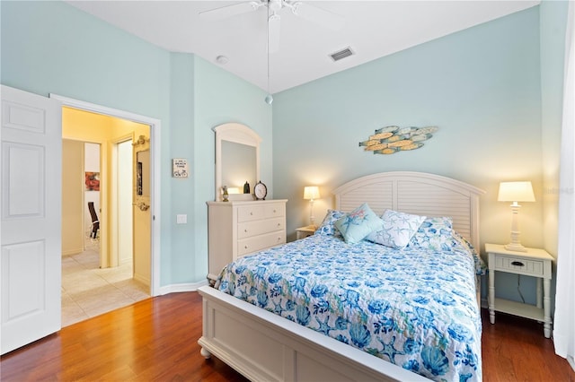 bedroom featuring hardwood / wood-style flooring and ceiling fan