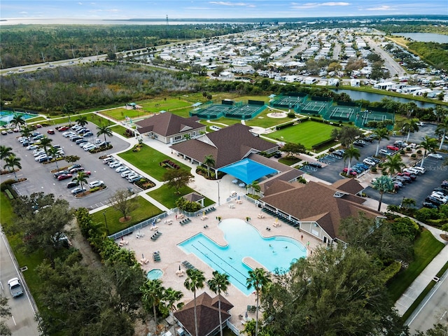 birds eye view of property featuring a water view