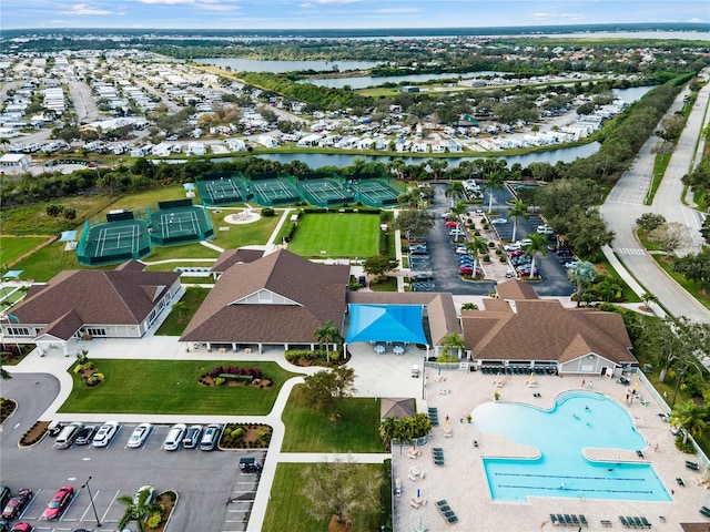 birds eye view of property featuring a water view