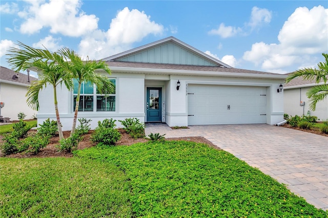 single story home with a garage