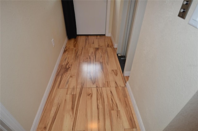 hall featuring light hardwood / wood-style floors