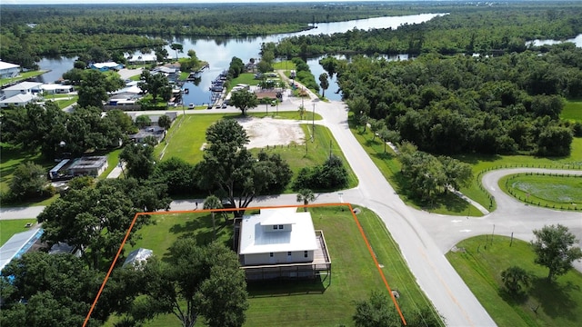 birds eye view of property featuring a water view